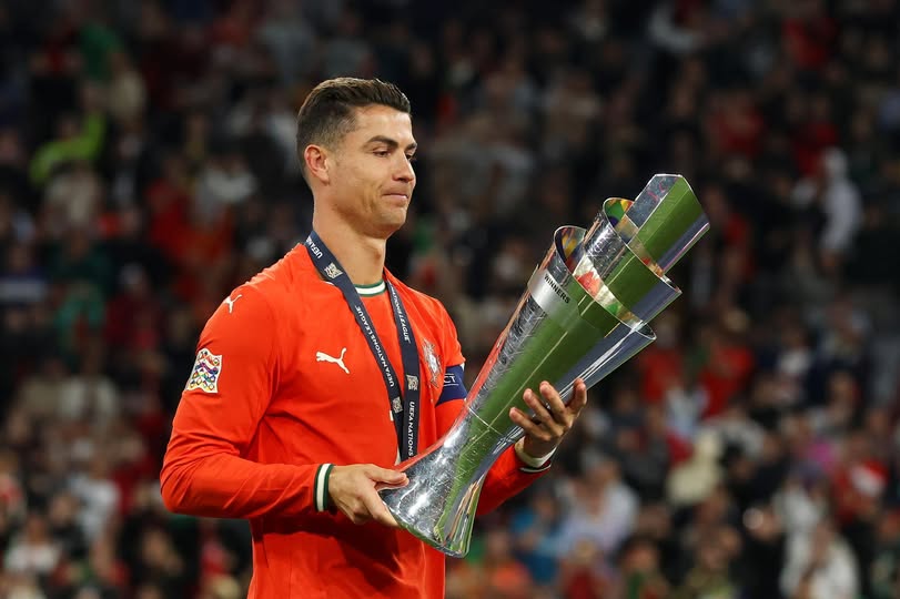Cristiano Ronaldo lifts the UEFA Nations League trophy after Portugal's victory over Spain in 2025